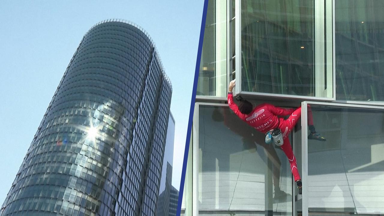 Beeld uit video: 'Franse Spider-Man' beklimt 160 meter hoog gebouw uit protest