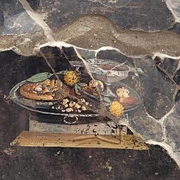 Wandgemaelde mit moeglichem Vorfahren der Pizza in Pompeji entdeckt