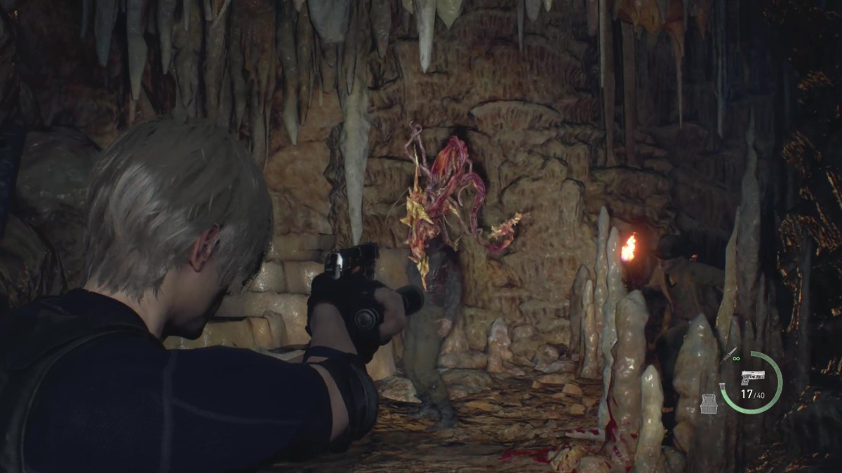 Ein Monster wird in Resident Evil 4 erschossen. Dieses Bild ist Teil eines Artikels über die besten Horrorspiele im Jahr 2023.