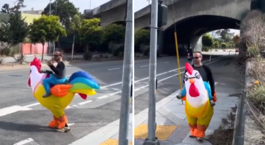 Ansehen Polizist in San Francisco verkleidet sich als buntes Huehnerkostuem