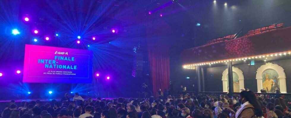 Public speaking on stage at the Bataclan for the final