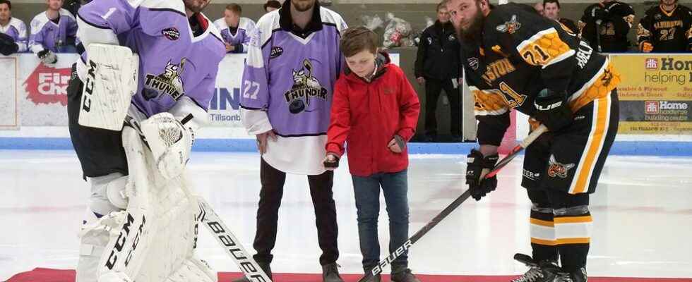 Thunder goalie takes ceremonial Hockey Fights Cancer faceoff