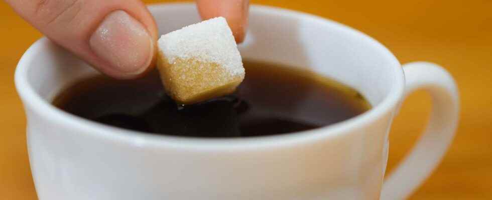 Why does sugar dissolve better in hot water than in