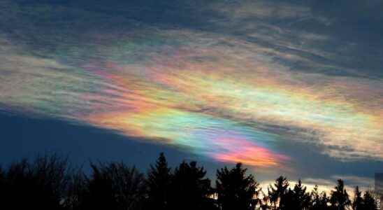 Extraordinary weather phenomenon iridescent clouds