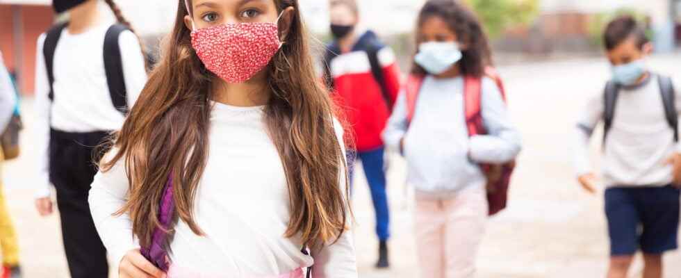 Mask at school end of wearing a mask at recess