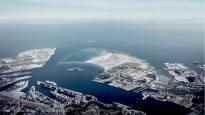 A large artificial island rises in front of Copenhagen