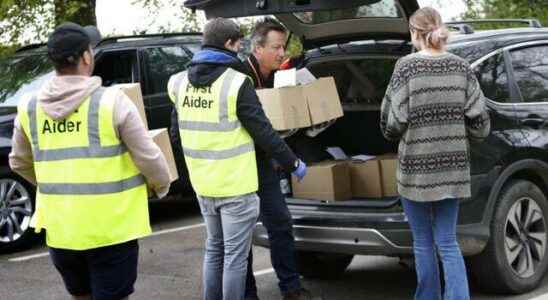 David Cameron sat in the drivers seat set off to