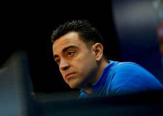 WOMENS FOOTBALL Xavi surrenders to the feminine Its an