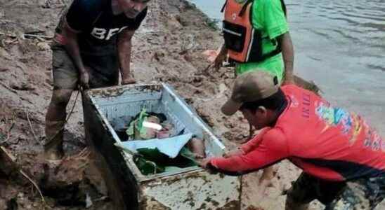 11 year old boy survived landslide in Philippines by hiding in refrigerator