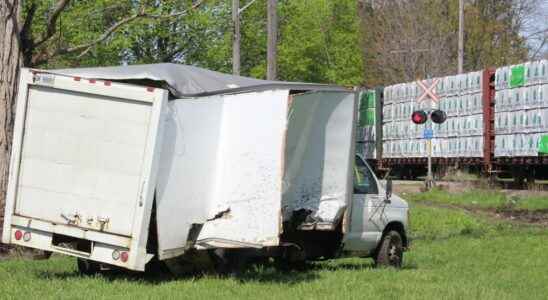 Cube van struck by freight train in Chatham