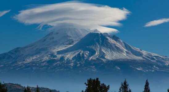 Extraordinary weather phenomenon clouds clinging to the mountains