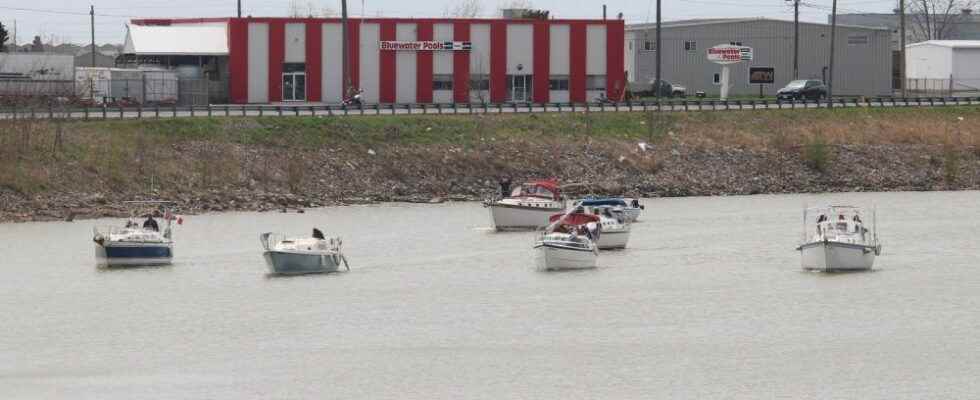 Flotilla of Thames River Yacht Club members cruise into downtown