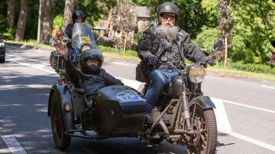 In the sidecar motorcycle tour for people with disabilities can