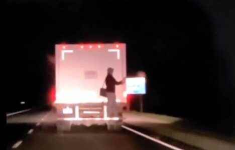 Police investigating after person hitches ride on back of truck