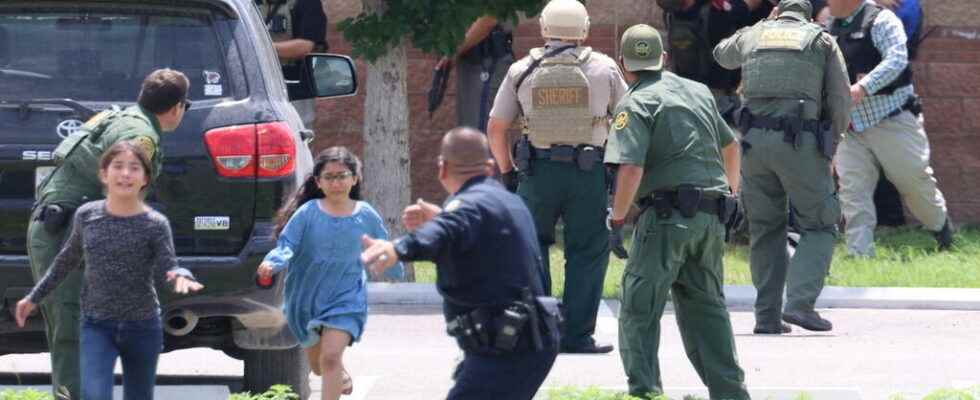 police officers from Uvalde were collected their children blocking other