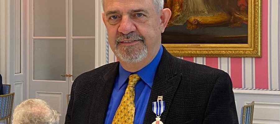 Theater company founder receives Meritorious Service Medal