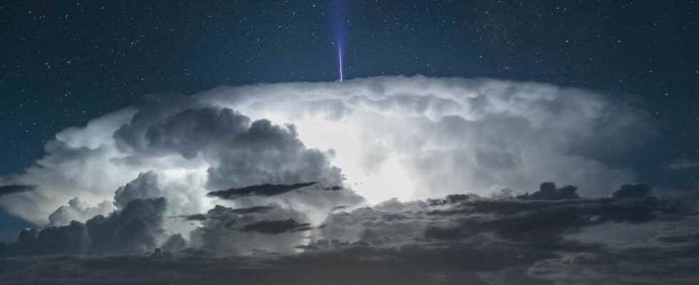 A gigantic blue jet departing from a storm cloud has