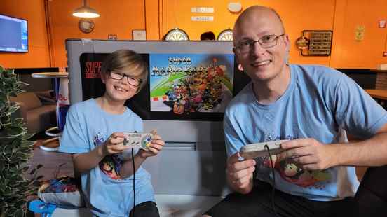 Gerard and son Rune participate in the Super Mario Kart