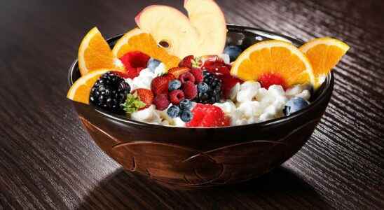 Refreshing bowl of fromage blanc carrot orange apple raspberry