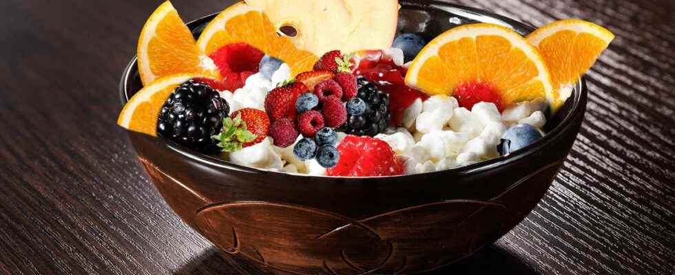 Refreshing bowl of fromage blanc carrot orange apple raspberry