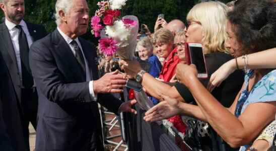 the crowd cheers Charles III just proclaimed king