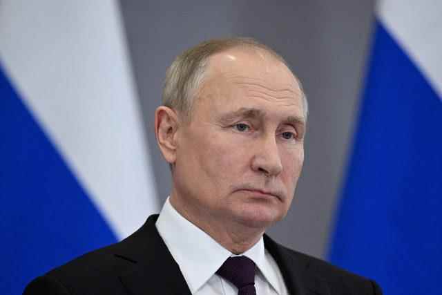 FILE PHOTO: Russian President Putin attends a news conference in Astana