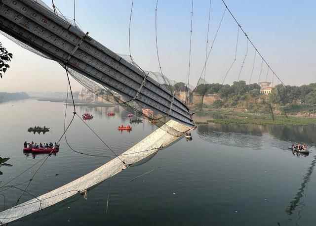 2022-10-31T035206Z_272729687_RC22CX90HY1S_RTRMADP_3_INDIA-ACCIDENT-BRIDGE