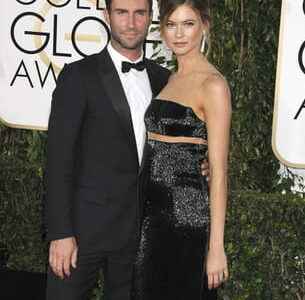 Behati Prinsloo Adam Levines wife reveals her baby bump