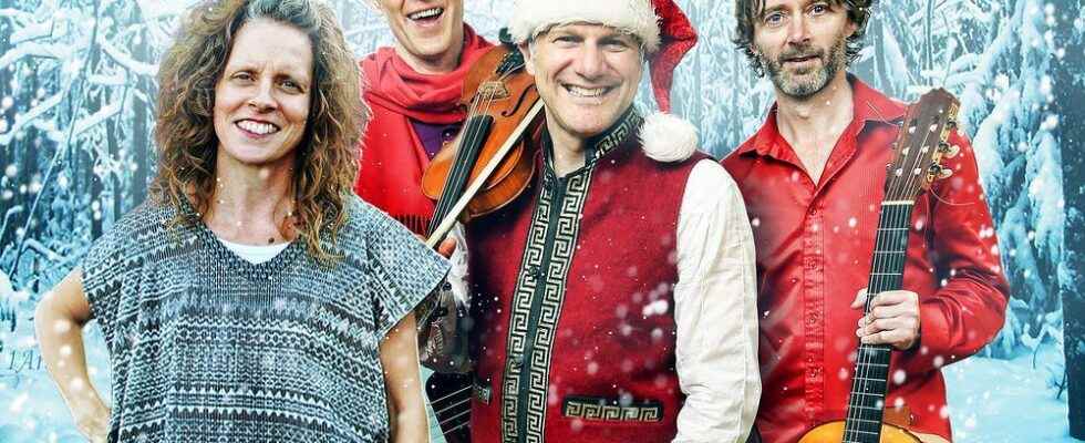 Sultans of Strings Christmas Caravan stopping in Highgate