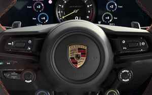 Porsche tops DAX on day of entry into blue chip