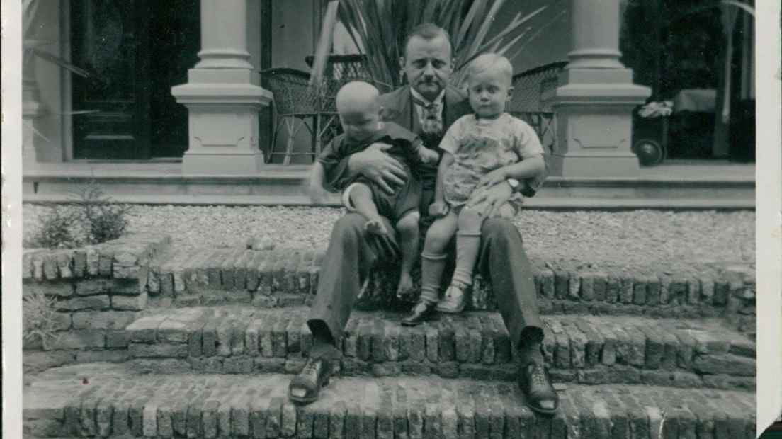 Camp doctor Nico van Nieuwenhuysen and his two sons.