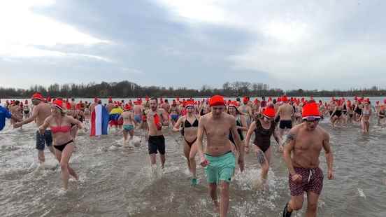 Nice and refreshing to run into the water with hundreds