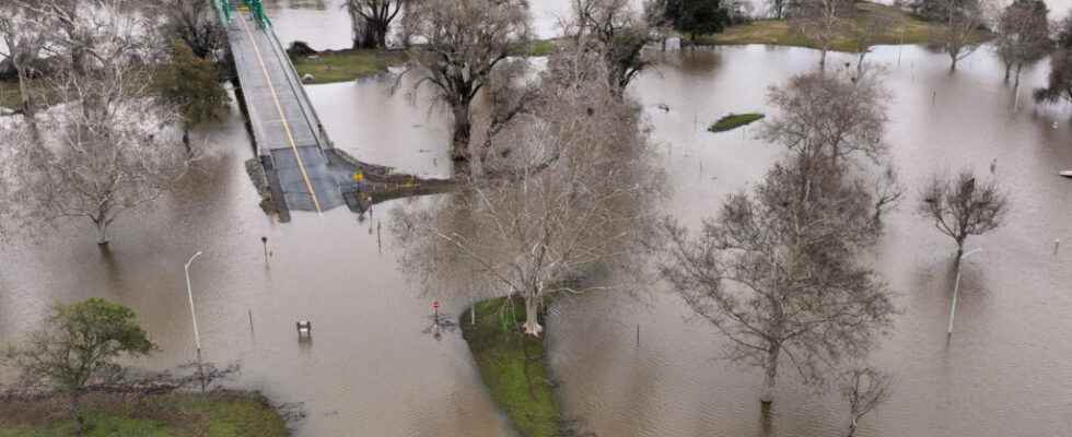 President Biden visits California on bad weather front