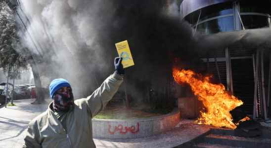 angry protesters vandalize banks