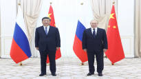 China is 6 0 stronger Chinas leader travels to Russia