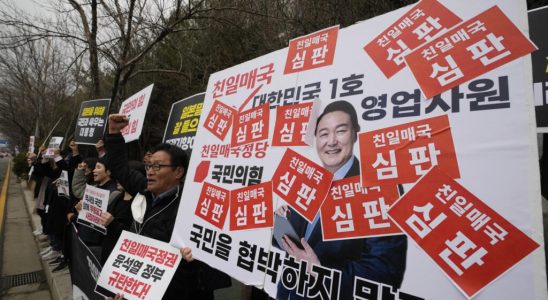 South Koreans protest against compensation plan for victims of Japanese