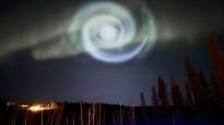 Among the aurora borealis a blue spiral appeared in Alaska