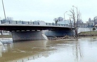 Clearing debris closing two downtown Chatham bridges