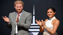 Prince Harry attends Charles coronation Meghan stays at home with