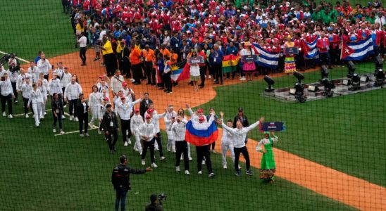 Russian athletes perform under their flag during a competition in