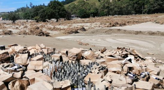 Tens of thousands of wine bottles are dug out of