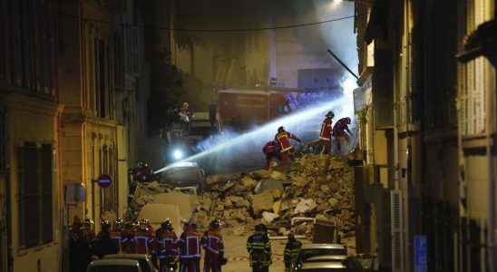 two lifeless bodies extracted from the ruins