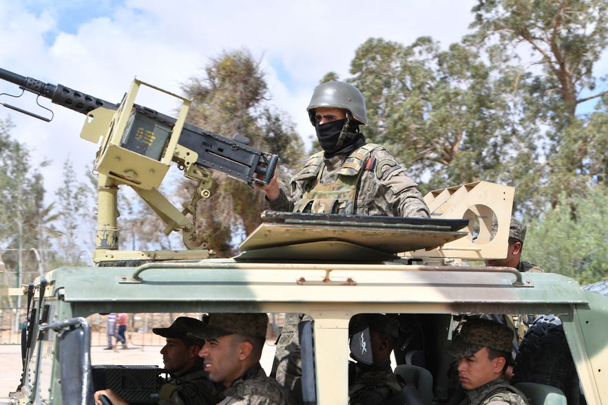 Soldiers secure a perimeter near the Ghriba Synagogue after an attack on May 10, 2023 in Djerba, Tunisia.