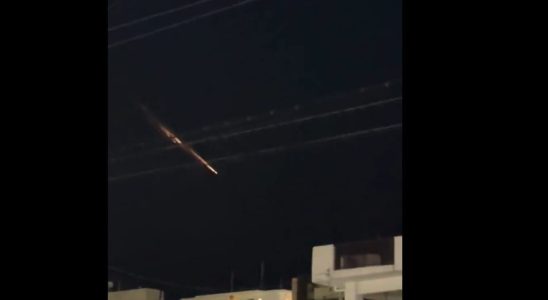 A burning rocket observed in the sky in the middle