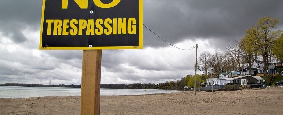 As summer nears popular beach remains blocked amid land battle