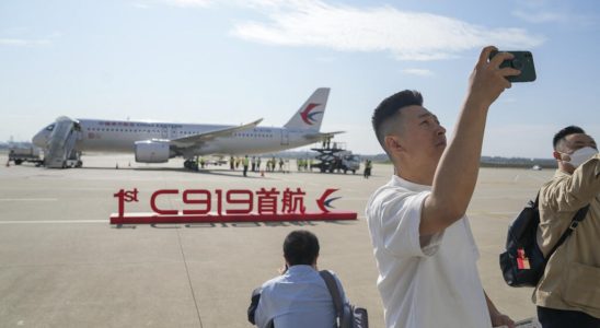 China celebrates first commercial flight of Chinese designed airliner