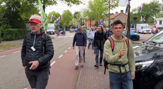 Climate activists walk along the A12 in the run up to