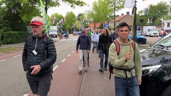 Climate activists walk along the A12 in the run up to