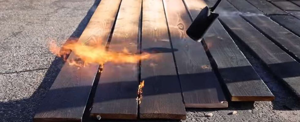 It burns the surface of flower bed boards after