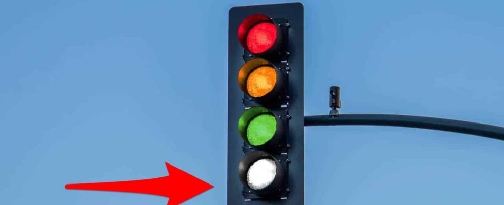 A fourth light on traffic lights why adding a